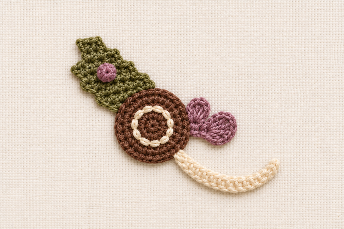 Generated design preview of a small freeform crochet scrumble with seed, stepped wing, unequal-shell fan, puff, orbit and hooked cord.